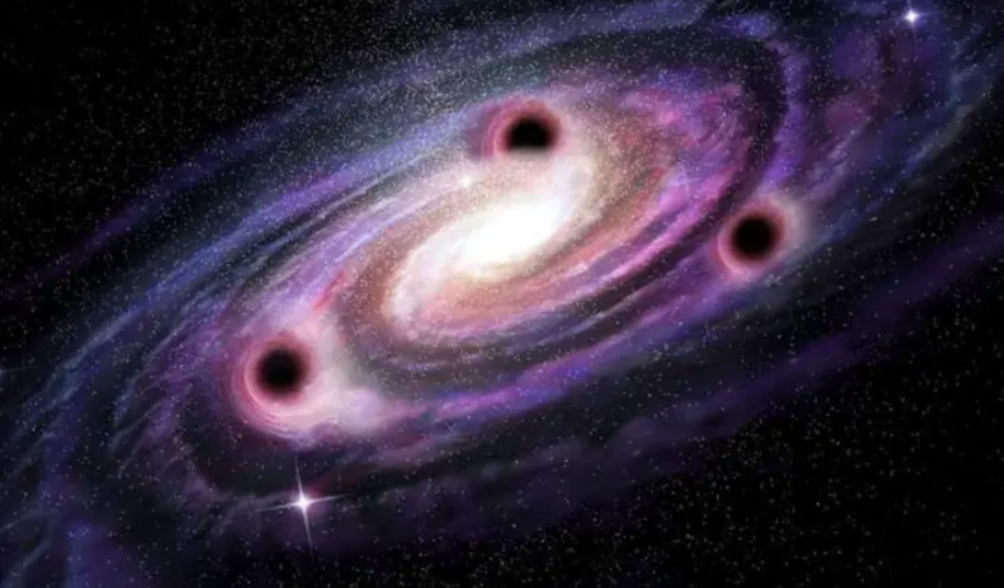 A single galaxy harbors three supermassive black holes, each with a mass exceeding 90 million Suns.